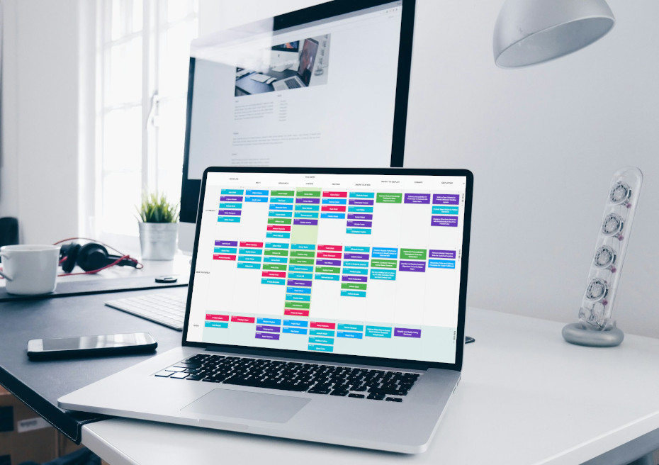 The free Kanban Tool board on a laptop screen