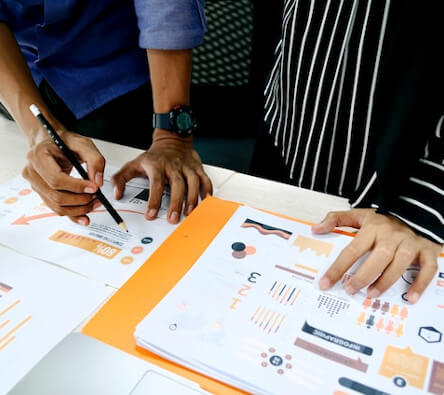 Team looking at performance metrics