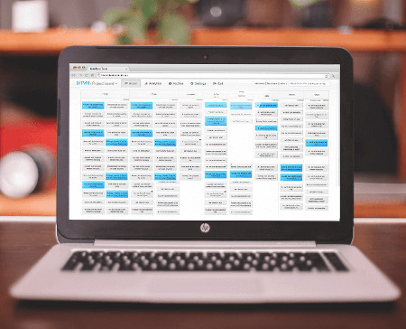 A Kanban Tool On-Site board on a laptop